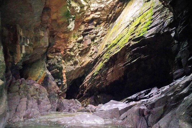 7 Arches Kayak Tour - Finding the private beach and cave waterfall