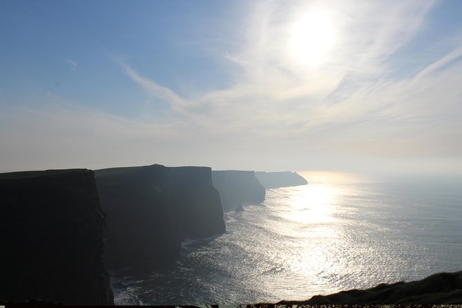 Cliffs of Moher including Cliffs of Moher Boat Experience Luxury Car Tour - Taking the Doolin boat to sea level