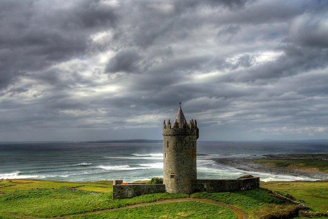 Cliffs of Moher including Cliffs of Moher Boat Experience Luxury Car Tour - Standing above the Cliffs of Moher