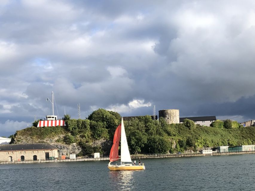 Cork: 2-Hour Guided Cork Harbour Scenic Cruise - Boarding the bright orange boat