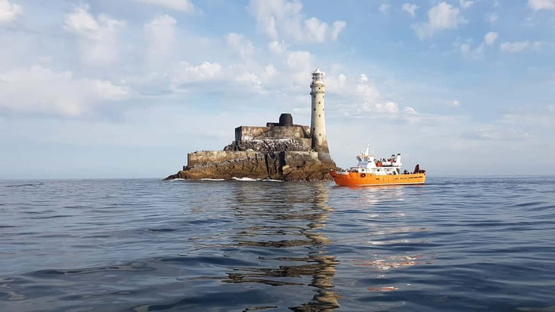 Cork: Fastnet Rock Lighthouse and Cape Clear Island Tour - Ancient stones, a Napoleonic tower, and Dún an Óir