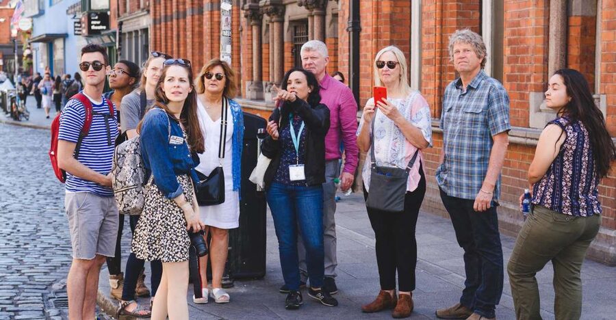 Dublin: Delicious Walking Food Tour - Meeting the guide beneath the Spire