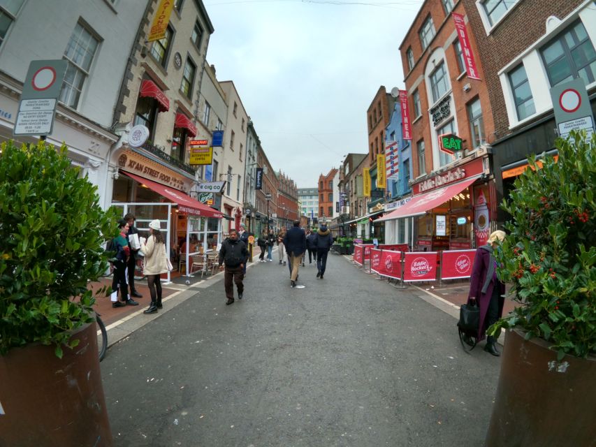 Dublin: Dublin City Highlights Private Guided Walking Tour - Crossing the Ha’penny Bridge
